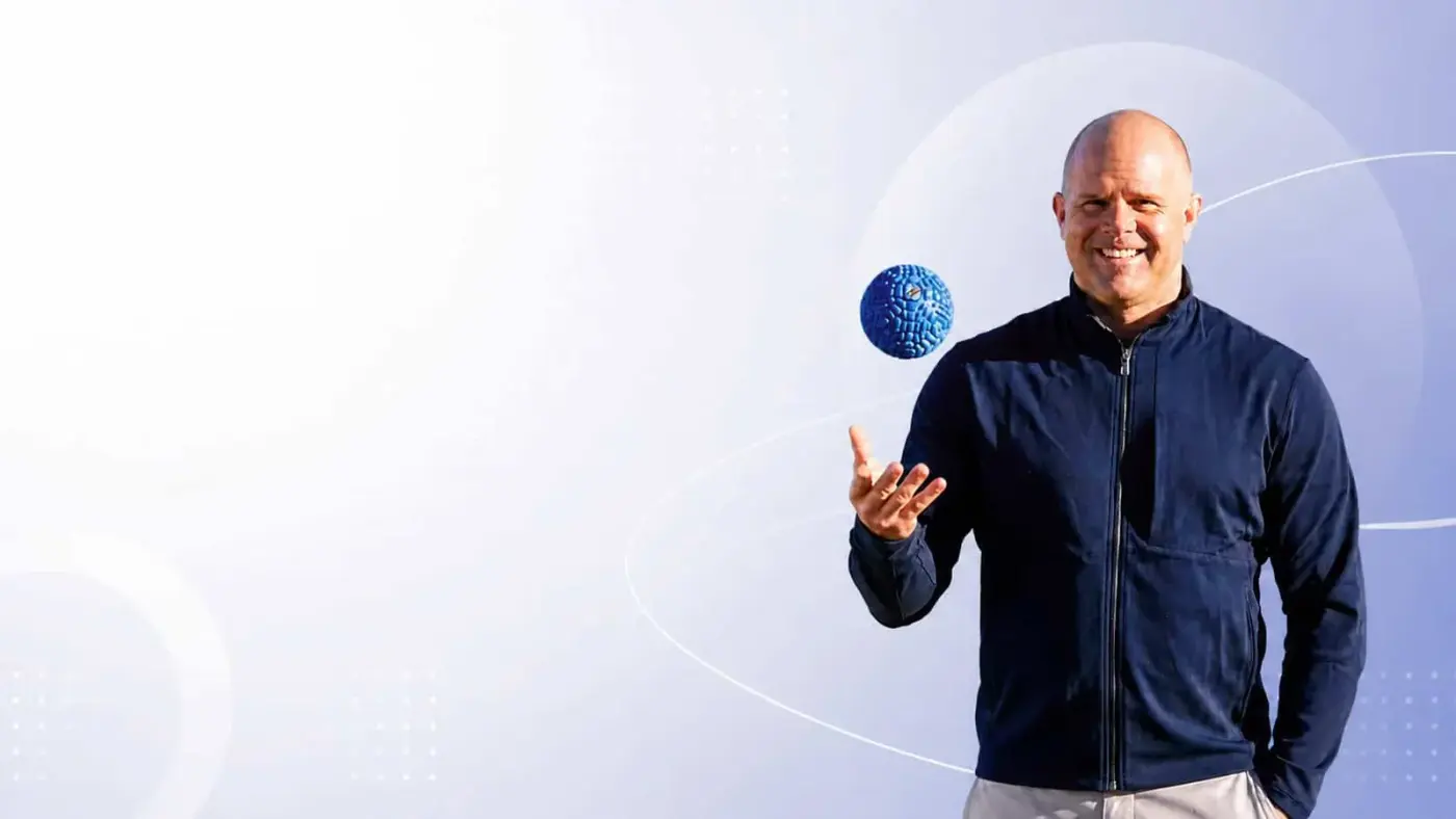 Kelly Starrett of The Ready State holding a mobility ball